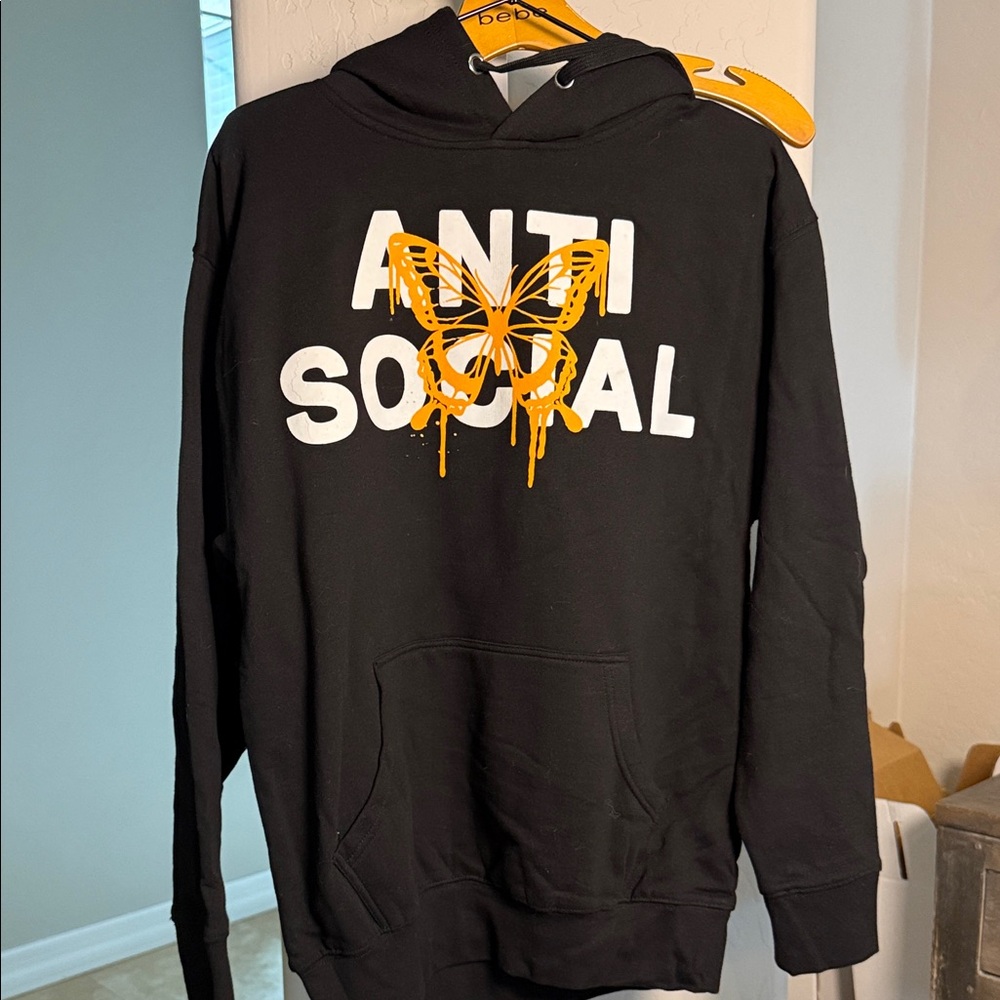 Fashion Nova Women’s Black Hoodie with Orange Butterfly Graphic